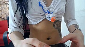 Young latina cam girl with glasses in solo performance