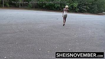 Ebony girl MsNovember squatting pissing public in skirt upskirt heels.