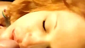 Amateur redhead babe deepthroats monster cock in close-up for hardcore cumshot facial