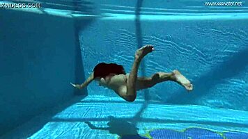Irina Russia displays her figure in an underwater pool setting
