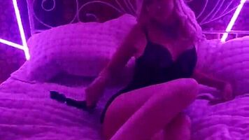 i watched this beautiful girl erotically movin on the bed, her tits and ass so cute and blonde
