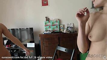 Mira and Landa play strip poker in Amsterdam apartment.