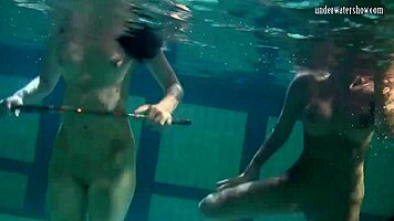 underwater lesbian bathing turns steamy on beach