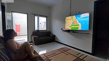 Teen brunette plays videogame on guy's lap, discovers huge interracial cock leading to amateur orgasm