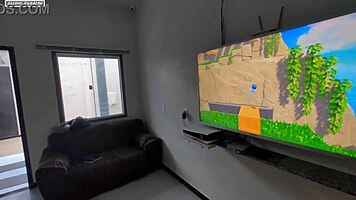 Teen brunette plays videogame on guy's lap, discovers huge interracial cock leading to amateur orgasm