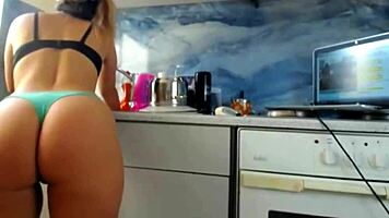 Feeling the rush as cute milf fingers her ass in lingerie on webcam