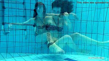 redheaded katrin teasingly stripping underwater 😏