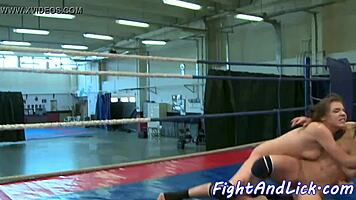 In the ring, two lezzie wrestlers passionately rub and lick each other's pussies during a glamour match