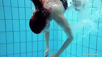 redheaded katrin teasingly stripping underwater 😏