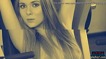 Flexible petite blonde teen stretches in yoga workout at the gym