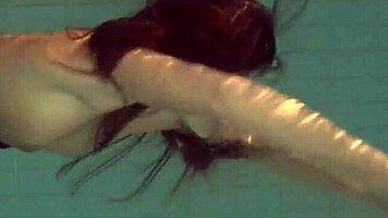 Natalia Kupalka swims naked in the pool, looking cute