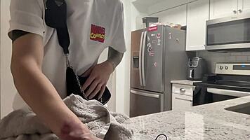 Young 18+ thug with tattoo twerks big ass in kitchen shorts, hairless close-up amateur dancing