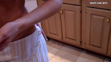 Both young girls take a cock in the kitchen