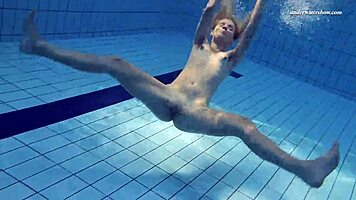 Absolute underwater blonde beauty Elena Proklova with natural tits