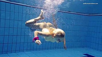 Absolute underwater blonde beauty Elena Proklova with natural tits