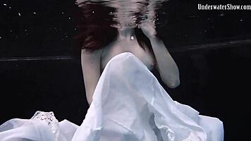 aqua girl andrejka strips underwater in pool