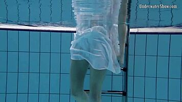 aqua girl andrejka strips underwater in pool