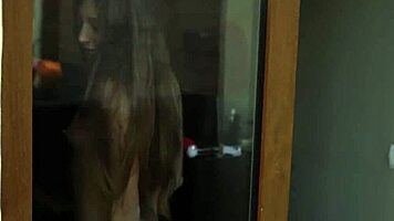 Teenage girl in her lingerie position and enjoying herself with adult toys