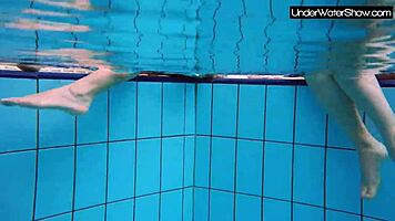 bubarek and birtakik splash and tease each other underwater in the pool, brunette teens in bikinis