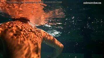 Lozhkova bathes in see through shorts in the pool