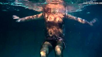 Lozhkova bathes in see through shorts in the pool