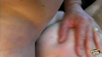 green-eyed brunette deepthroats monster cock then takes anal fucking on the sofa