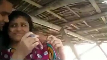 Two couples relax in hut