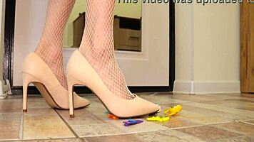 Wife in heels crushes toys with her big ass and small tits exposed.