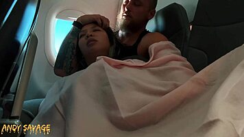 Intimate public fingering on airplane with dirty talk and moans