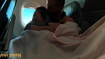 Intimate public fingering on airplane with dirty talk and moans