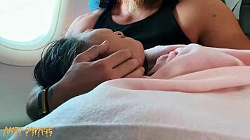 Intimate public fingering on airplane with dirty talk and moans