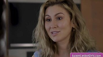 Horny lesbian babes Paige Owens and Liz Jordan kiss and rub clits