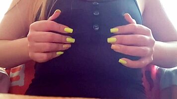 Excited brunette student teases her huge natural tits solo in front of the camera