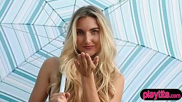 Beautiful blonde babe outdoor strip at the alps.