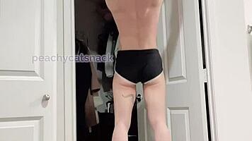 petite asian muscle girl performs nude archer and weighted pull-ups in gym