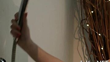 Solo beauty teases with fingers on her wet pussy lips