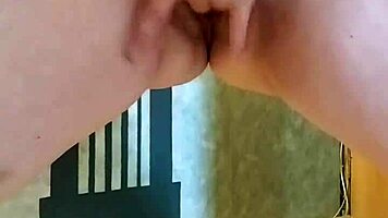 Girl spanks her ass in leggings while fingering pussy, husband at work.