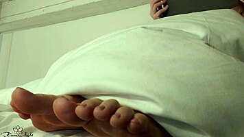 blonde's oiled legs getting a sensual massage