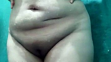 My busty stepmother touches herself so hot while bathing, damn!