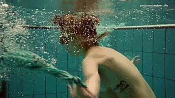 Dasha Explores Underwater Depths At The Beach