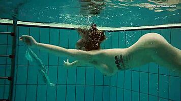 Dasha Explores Underwater Depths At The Beach