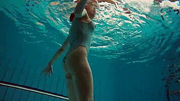 Dasha Explores Underwater Depths At The Beach