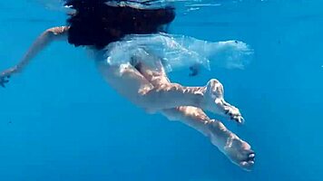 lana the hot chick swims nude underwater, showing her small tits