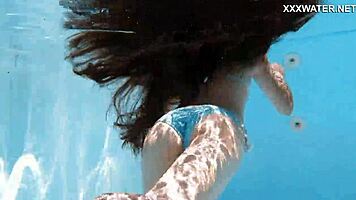 lana the hot chick swims nude underwater, showing her small tits