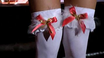 Young teen in stockings and shoes rubs vigorously in amateur European costume