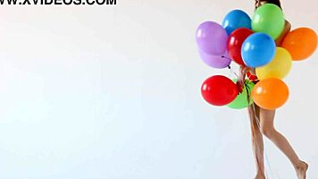 Teen Poses Nude With Balloons In Fun Photo Session.