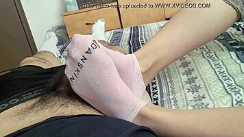 Shy teen teases friend's cock with toes, delivers footjob to cumshot!
