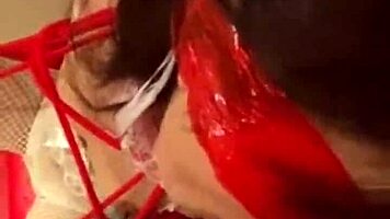 Stunning teen brunette in a tightCORSET:], wearing bondage restraints and cat ears costume performs a fake blowjob