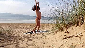 i filmed a curvy milf changing clothes and exercising naked on the beach