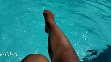 Feet in Pool with Lots of Water